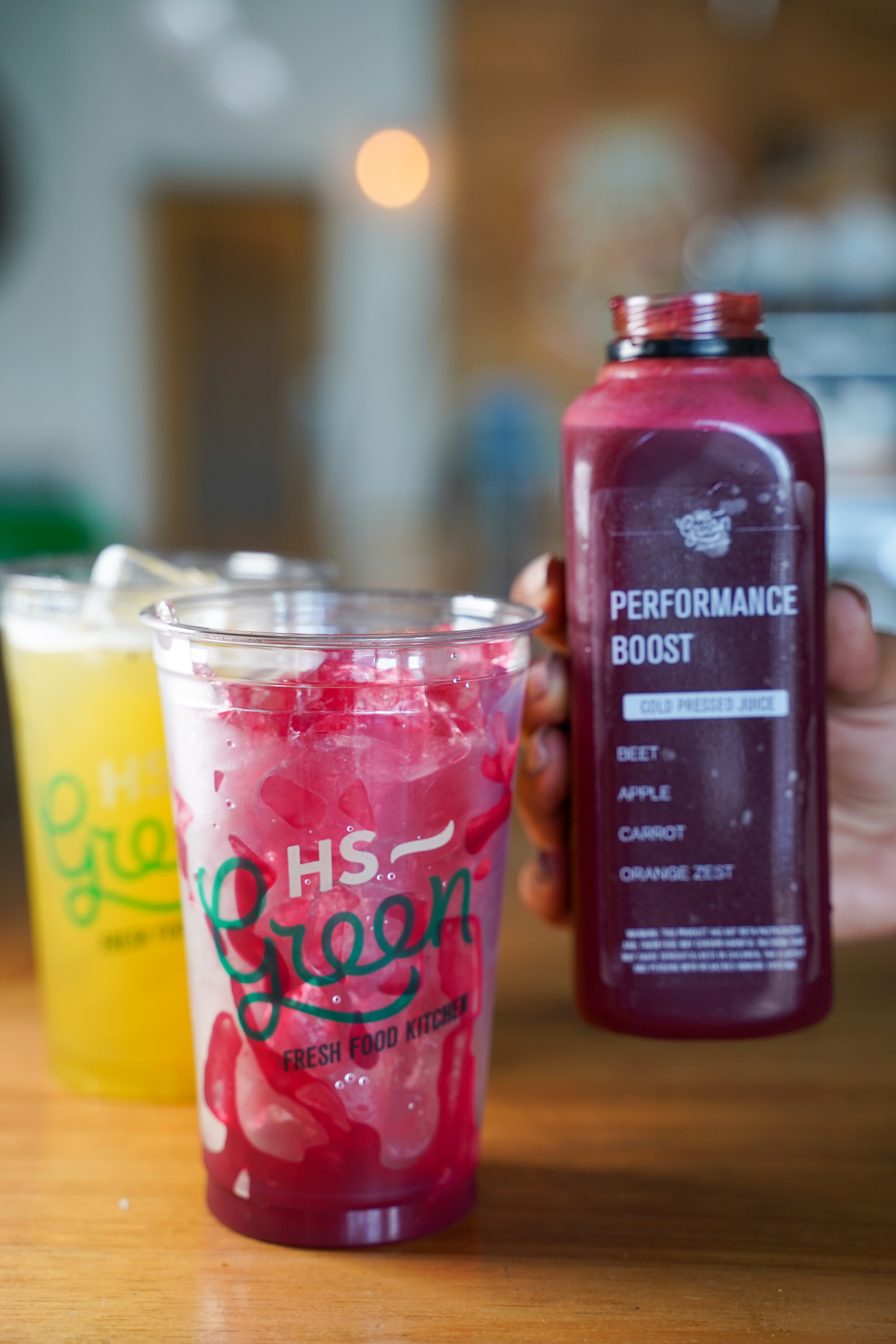 Performance Boost Cold Pressed Juice served on ice.